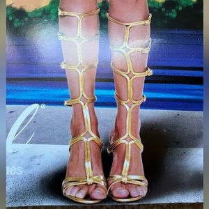 Women’s gladiator shoes, worn once size 8 with 5 inch heels